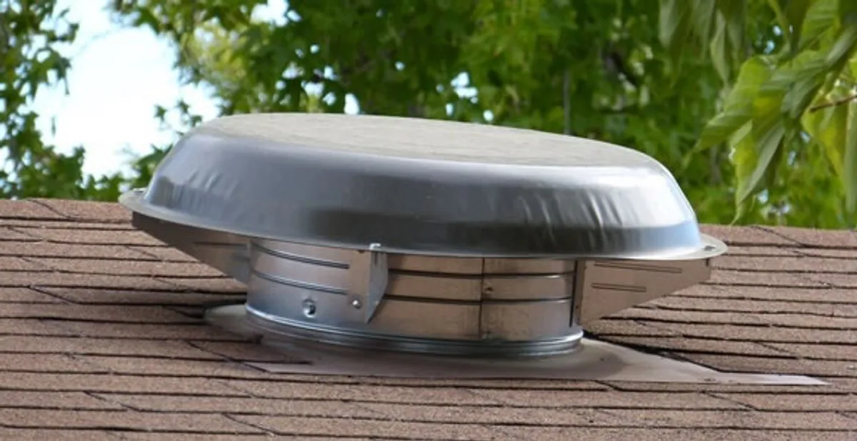attic fan installation services with low-profile roof ventilation unit in Tacoma, WA