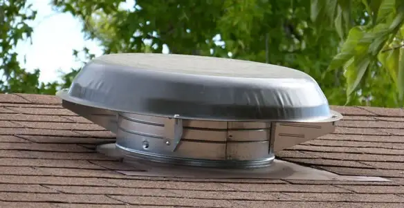 attic fan installation services with low-profile roof ventilation unit in Tacoma, WA