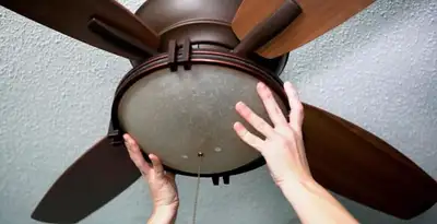 Ceiling fan repair and reinstallation on ceiling mount in Tacoma, WA