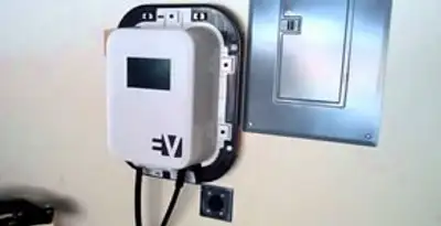 Electric car charger installation with wall-mounted EV charging station in Tacoma, WA