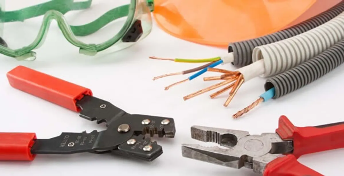 Electrical wiring repair with professional tools and safety equipment in Pacific, WA