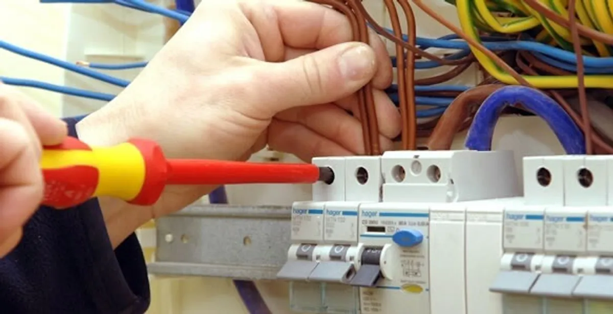 electrician services performing professional electrical panel wiring and connections in Tacoma, WA