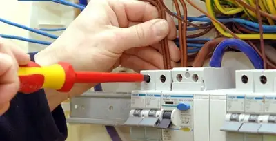 electrician services performing professional electrical panel wiring and connections in Tacoma, WA