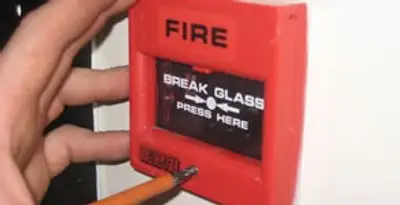 fire alarm installation service showing manual fire alarm pull station installed by licensed electricians in Tacoma, WA