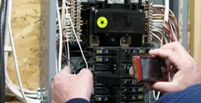 Home electrical inspection of circuit breaker panel by licensed electrician in Tacoma, WA