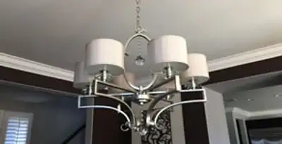 Modern chandelier installation with multiple light fixtures in Tacoma, WA