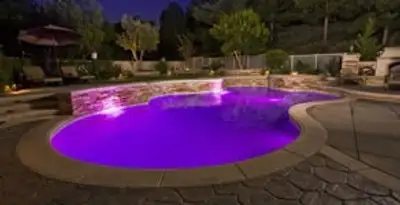pool light installation and repair services illuminating a residential swimming pool in Tacoma, WA