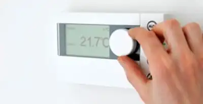 Thermostat installation service with professional adjusting temperature control in Tacoma, WA